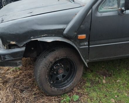 Черный Опель Кампо, объемом двигателя 2.7 л и пробегом 340 тыс. км за 949 $, фото 8 на Automoto.ua