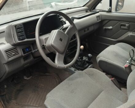 Черный Опель Кампо, объемом двигателя 2.7 л и пробегом 340 тыс. км за 949 $, фото 3 на Automoto.ua