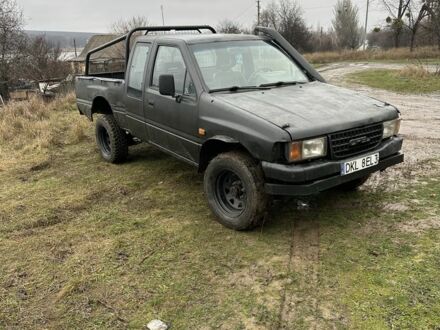 Черный Опель Кампо, объемом двигателя 3 л и пробегом 321 тыс. км за 1900 $, фото 1 на Automoto.ua