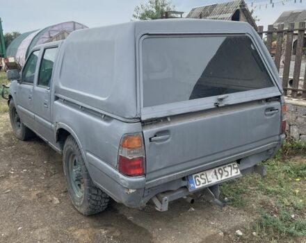 Серый Опель Кампо, объемом двигателя 3 л и пробегом 200 тыс. км за 1900 $, фото 3 на Automoto.ua