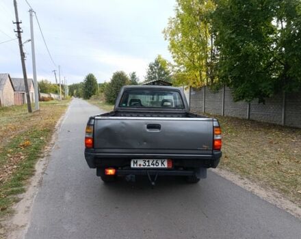 Серый Опель Кампо, объемом двигателя 2.5 л и пробегом 286 тыс. км за 3300 $, фото 4 на Automoto.ua