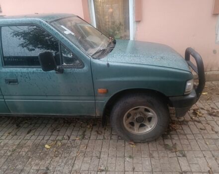 Зеленый Опель Кампо, объемом двигателя 2 л и пробегом 299 тыс. км за 2386 $, фото 1 на Automoto.ua