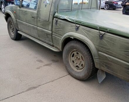 Зеленый Опель Кампо, объемом двигателя 3 л и пробегом 186 тыс. км за 4500 $, фото 6 на Automoto.ua