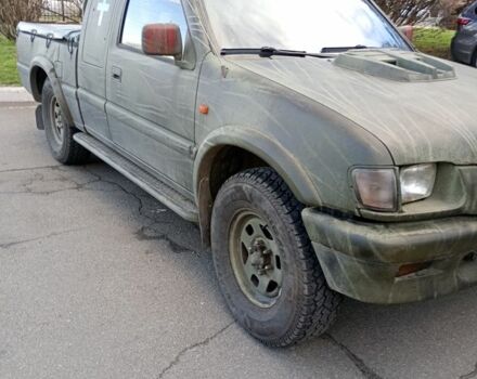 Зеленый Опель Кампо, объемом двигателя 3 л и пробегом 186 тыс. км за 4500 $, фото 1 на Automoto.ua