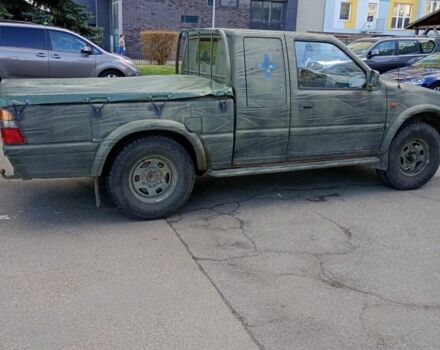Зеленый Опель Кампо, объемом двигателя 3 л и пробегом 186 тыс. км за 4500 $, фото 4 на Automoto.ua