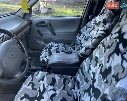 Белый Опель Комбо груз.-пасс., объемом двигателя 1.4 л и пробегом 274 тыс. км за 1300 $, фото 7 на Automoto.ua