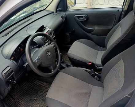 Белый Опель Комбо груз.-пасс., объемом двигателя 1.2 л и пробегом 410 тыс. км за 3500 $, фото 7 на Automoto.ua