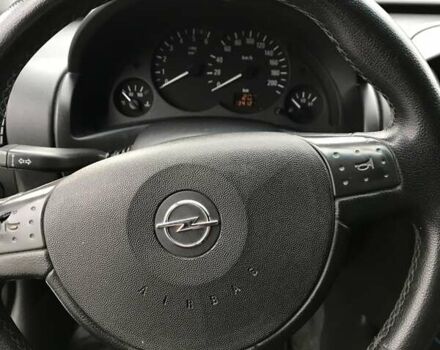 Белый Опель Комбо груз.-пасс., объемом двигателя 1.2 л и пробегом 154 тыс. км за 3800 $, фото 13 на Automoto.ua