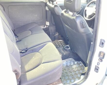 Белый Опель Комбо груз.-пасс., объемом двигателя 1.3 л и пробегом 300 тыс. км за 2600 $, фото 6 на Automoto.ua