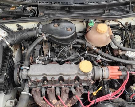 Белый Опель Комбо груз.-пасс., объемом двигателя 1.4 л и пробегом 470 тыс. км за 595 $, фото 8 на Automoto.ua