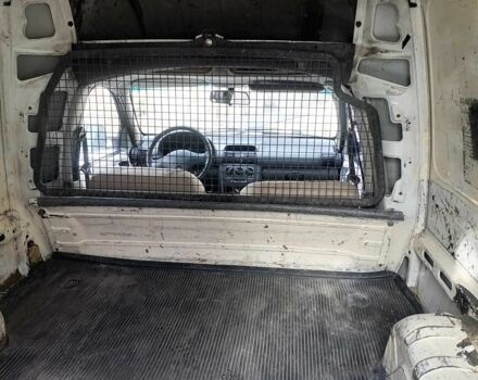 Белый Опель Комбо груз.-пасс., объемом двигателя 1.4 л и пробегом 470 тыс. км за 595 $, фото 6 на Automoto.ua