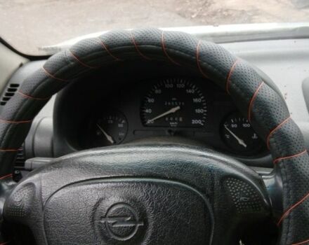 Белый Опель Комбо груз.-пасс., объемом двигателя 1.4 л и пробегом 285 тыс. км за 500 $, фото 7 на Automoto.ua