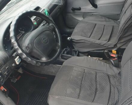 Белый Опель Комбо груз.-пасс., объемом двигателя 1.3 л и пробегом 300 тыс. км за 1499 $, фото 6 на Automoto.ua