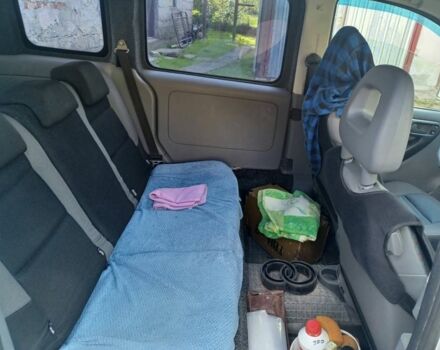 Белый Опель Комбо груз.-пасс., объемом двигателя 1.2 л и пробегом 290 тыс. км за 3600 $, фото 3 на Automoto.ua