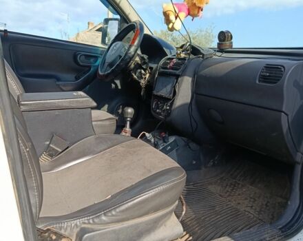 Белый Опель Комбо груз.-пасс., объемом двигателя 2 л и пробегом 260 тыс. км за 5000 $, фото 5 на Automoto.ua