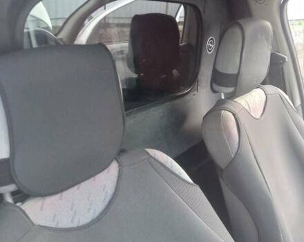 Белый Опель Комбо груз.-пасс., объемом двигателя 1.4 л и пробегом 450 тыс. км за 1250 $, фото 4 на Automoto.ua