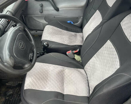 Белый Опель Комбо груз.-пасс., объемом двигателя 1.4 л и пробегом 383 тыс. км за 1300 $, фото 11 на Automoto.ua