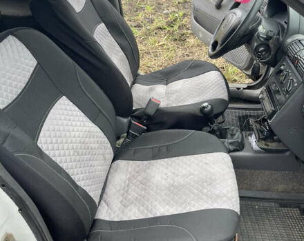 Белый Опель Комбо груз.-пасс., объемом двигателя 1.4 л и пробегом 383 тыс. км за 1300 $, фото 17 на Automoto.ua