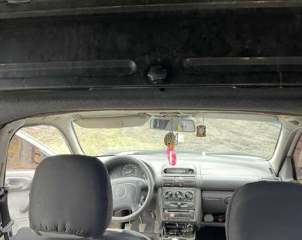 Белый Опель Комбо груз.-пасс., объемом двигателя 1.4 л и пробегом 383 тыс. км за 1300 $, фото 14 на Automoto.ua