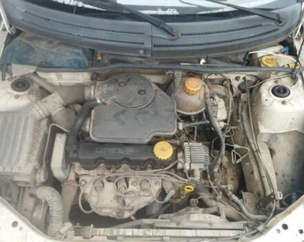 Белый Опель Комбо груз.-пасс., объемом двигателя 1.4 л и пробегом 300 тыс. км за 750 $, фото 3 на Automoto.ua