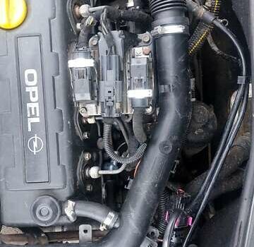 Белый Опель Комбо груз.-пасс., объемом двигателя 1.7 л и пробегом 310 тыс. км за 2350 $, фото 12 на Automoto.ua