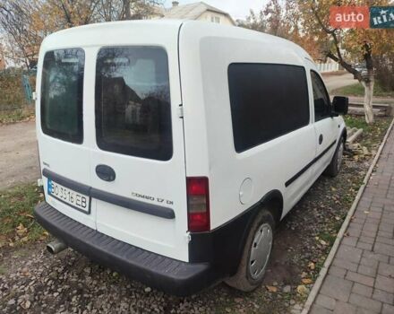 Белый Опель Комбо груз.-пасс., объемом двигателя 1.69 л и пробегом 235 тыс. км за 1998 $, фото 2 на Automoto.ua