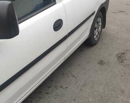 Белый Опель Комбо груз.-пасс., объемом двигателя 1.3 л и пробегом 286 тыс. км за 3300 $, фото 3 на Automoto.ua