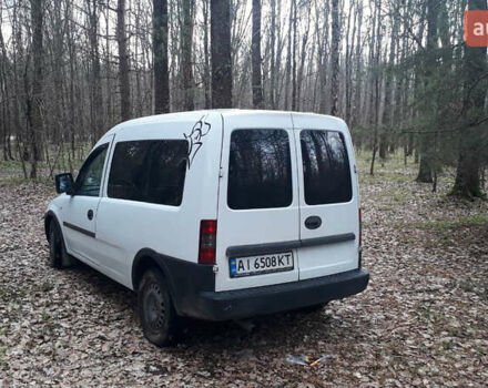 Белый Опель Комбо груз.-пасс., объемом двигателя 1.3 л и пробегом 220 тыс. км за 3800 $, фото 3 на Automoto.ua