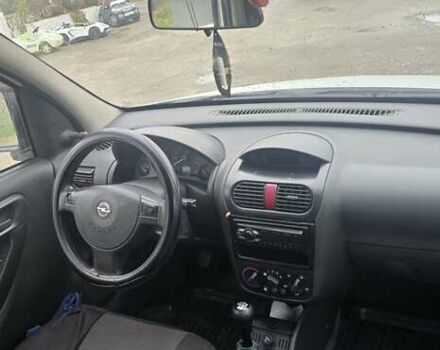 Белый Опель Комбо груз.-пасс., объемом двигателя 1.3 л и пробегом 370 тыс. км за 3650 $, фото 9 на Automoto.ua