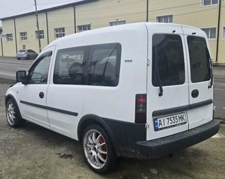 Белый Опель Комбо груз.-пасс., объемом двигателя 1.3 л и пробегом 370 тыс. км за 3650 $, фото 4 на Automoto.ua