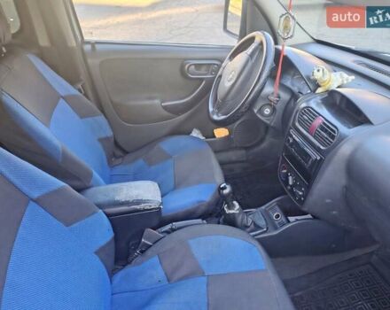 Белый Опель Комбо груз.-пасс., объемом двигателя 1.25 л и пробегом 200 тыс. км за 2450 $, фото 4 на Automoto.ua