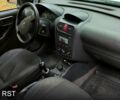 Белый Опель Комбо груз.-пасс., объемом двигателя 1.6 л и пробегом 270 тыс. км за 4800 $, фото 5 на Automoto.ua