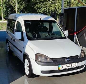 Белый Опель Комбо груз.-пасс., объемом двигателя 1.2 л и пробегом 254 тыс. км за 4150 $, фото 8 на Automoto.ua