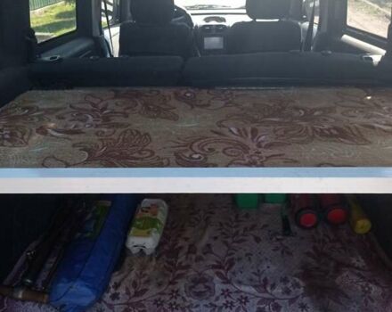 Белый Опель Комбо груз.-пасс., объемом двигателя 1.2 л и пробегом 350 тыс. км за 3800 $, фото 10 на Automoto.ua