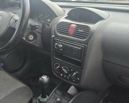 Белый Опель Комбо груз.-пасс., объемом двигателя 1.3 л и пробегом 370 тыс. км за 3650 $, фото 11 на Automoto.ua