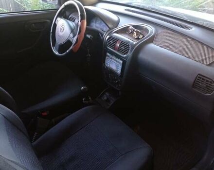 Белый Опель Комбо груз.-пасс., объемом двигателя 1.2 л и пробегом 350 тыс. км за 3800 $, фото 4 на Automoto.ua