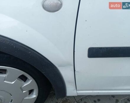 Белый Опель Комбо груз.-пасс., объемом двигателя 1.25 л и пробегом 220 тыс. км за 4999 $, фото 1 на Automoto.ua