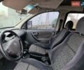 Белый Опель Комбо груз.-пасс., объемом двигателя 1.25 л и пробегом 286 тыс. км за 3500 $, фото 38 на Automoto.ua