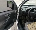 Белый Опель Комбо груз.-пасс., объемом двигателя 1.25 л и пробегом 328 тыс. км за 3700 $, фото 3 на Automoto.ua