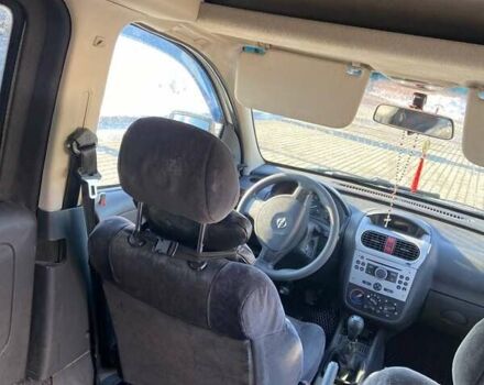 Белый Опель Комбо груз.-пасс., объемом двигателя 1.25 л и пробегом 390 тыс. км за 4350 $, фото 4 на Automoto.ua