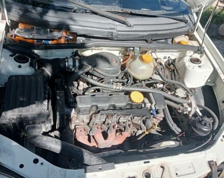 Белый Опель Комбо груз.-пасс., объемом двигателя 1.4 л и пробегом 280 тыс. км за 1600 $, фото 7 на Automoto.ua