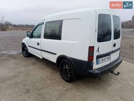 Белый Опель Комбо груз.-пасс., объемом двигателя 1.25 л и пробегом 275 тыс. км за 2800 $, фото 1 на Automoto.ua
