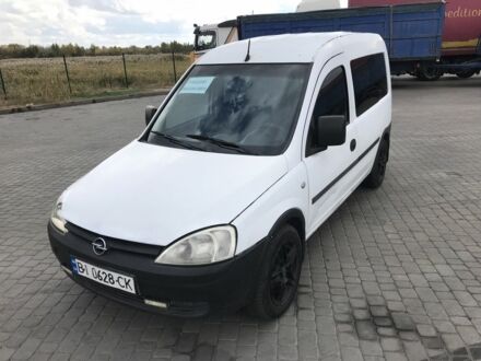 Белый Опель Комбо груз.-пасс., объемом двигателя 1.2 л и пробегом 250 тыс. км за 2400 $, фото 1 на Automoto.ua