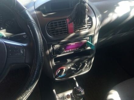 Белый Опель Комбо груз.-пасс., объемом двигателя 1.25 л и пробегом 314 тыс. км за 3100 $, фото 1 на Automoto.ua