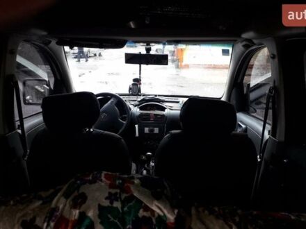 Белый Опель Комбо груз.-пасс., объемом двигателя 1.25 л и пробегом 270 тыс. км за 4300 $, фото 1 на Automoto.ua