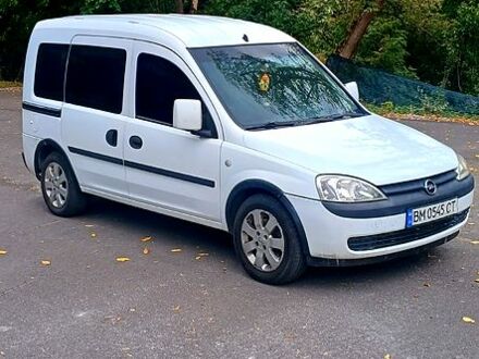 Белый Опель Комбо груз.-пасс., объемом двигателя 1.6 л и пробегом 300 тыс. км за 3450 $, фото 1 на Automoto.ua