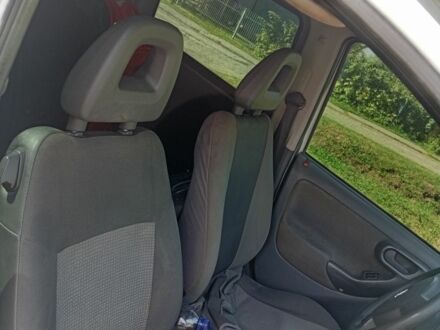 Белый Опель Комбо груз.-пасс., объемом двигателя 1.2 л и пробегом 320 тыс. км за 4500 $, фото 1 на Automoto.ua