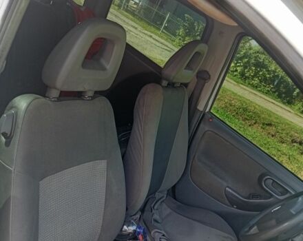 Белый Опель Комбо груз.-пасс., объемом двигателя 1.2 л и пробегом 320 тыс. км за 4500 $, фото 1 на Automoto.ua