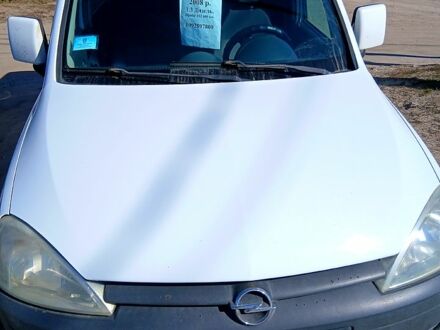 Белый Опель Комбо груз.-пасс., объемом двигателя 1.2 л и пробегом 255 тыс. км за 4600 $, фото 1 на Automoto.ua