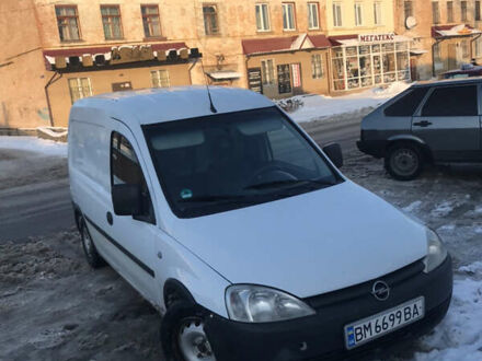 Белый Опель Комбо груз.-пасс., объемом двигателя 1.25 л и пробегом 410 тыс. км за 3100 $, фото 1 на Automoto.ua